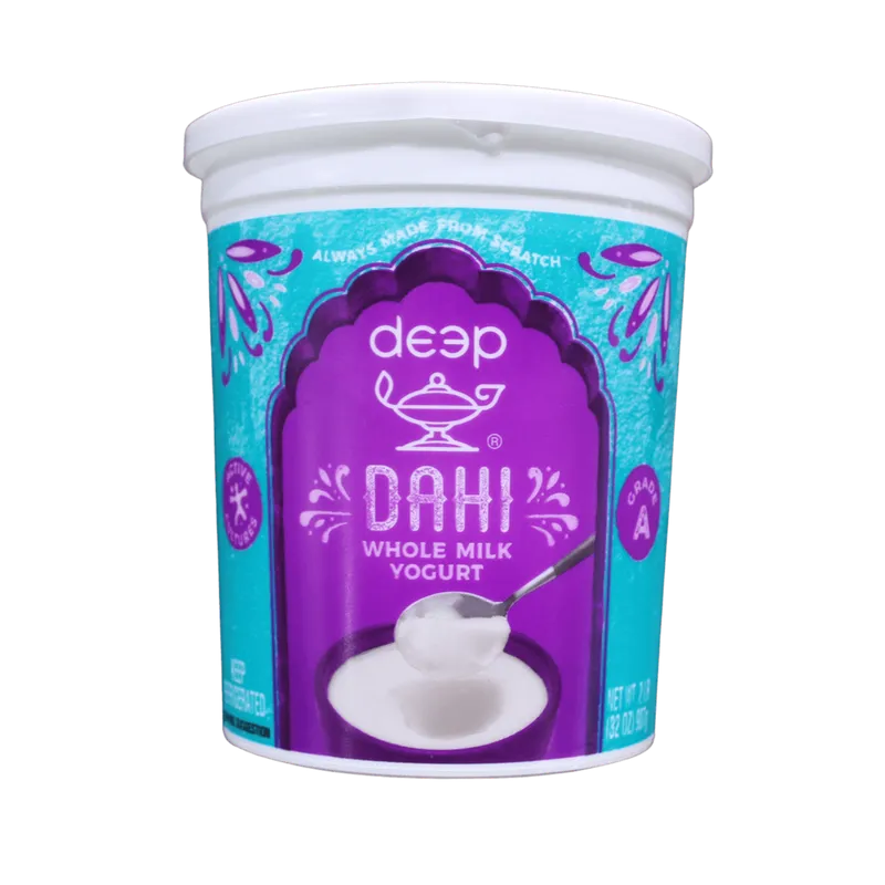 Container of deep brand whole milk yogurt with blue and purple design on a white background