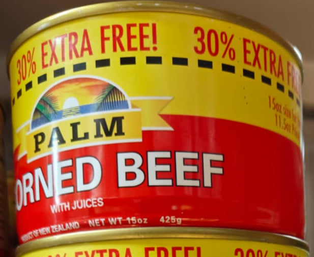 Cans of corned beef and corned mutton on a store shelf