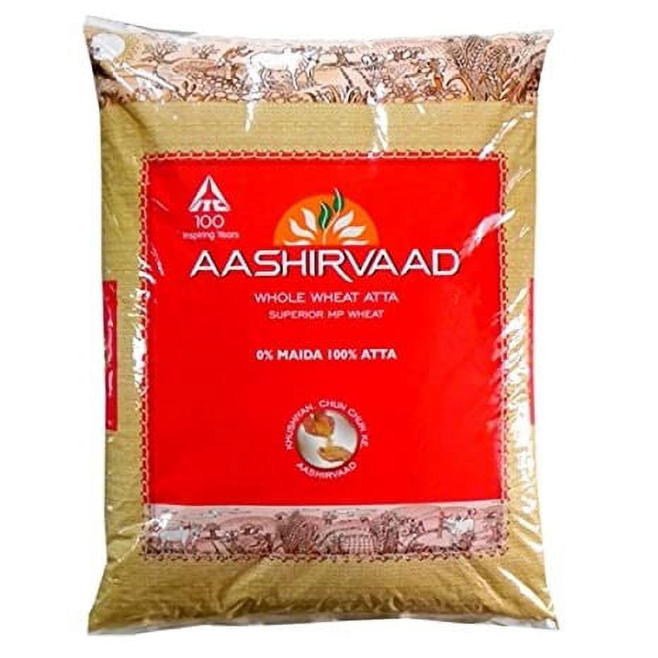 Aashirvaad whole wheat atta package on a white background