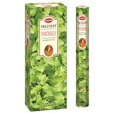 Nag Champa Patrunje incense packaging with green leaf design on box and white background on stick.