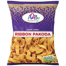 Packaged ribbon pakoda with A&B brand logo on a purple background