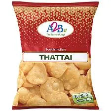 Packaged snack labeled 'THATTAI' with a brand logo on a red background